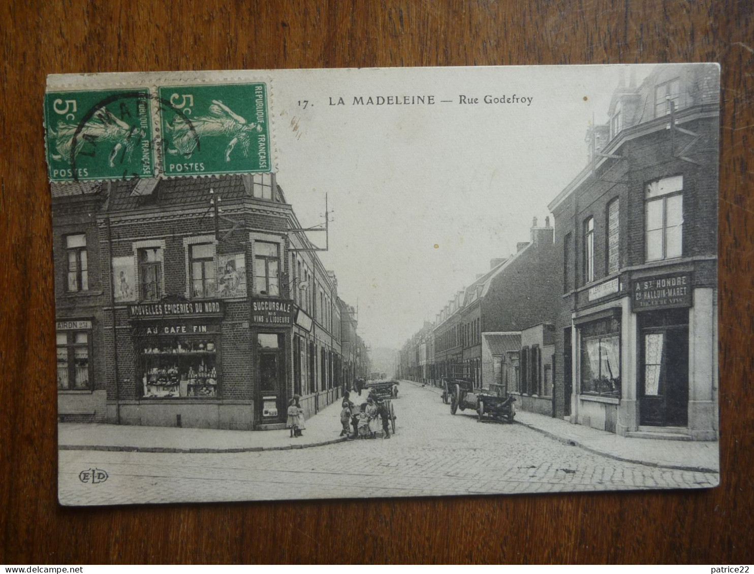 CPA écrite - LA MADELEINE RUE GODEFROY NOUVELLES EPICERIES DU NORD - La Madeleine