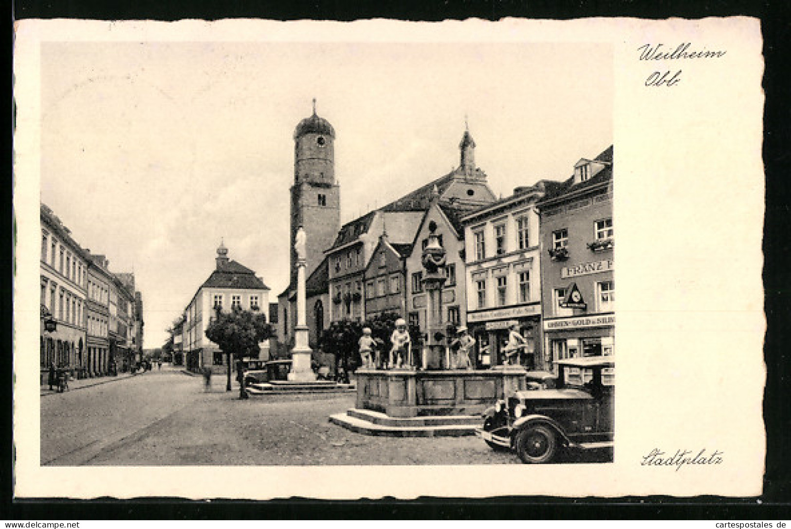 AK Weilheim /Obb., Stadtplatz Mit Säulendenkmal Und Kirche  - Weilheim