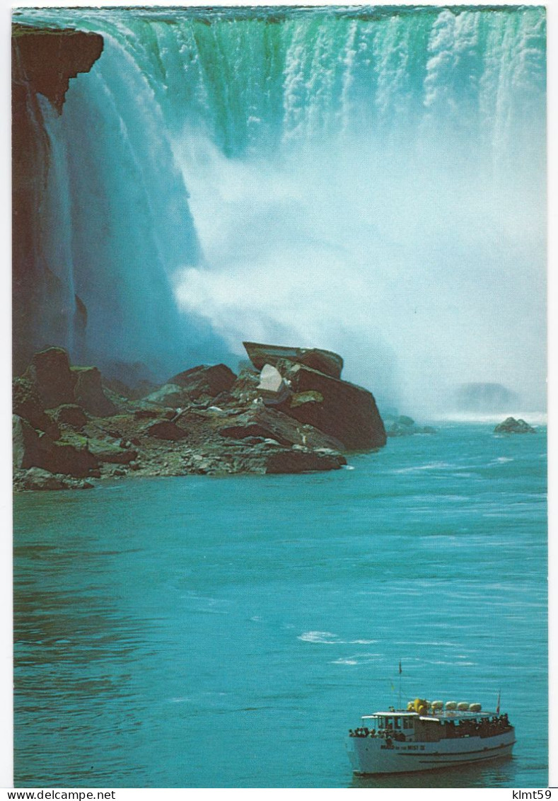 Niagara Falls - The "Maid Of The Mist" Tour Boat At The Foot Of The World Famous Canadian Horseshoe Falls - Niagara Falls