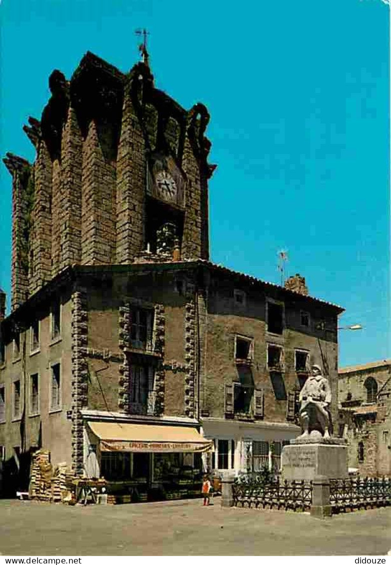 43 - Saugues - La Tour Des Anglais Et L'Eglise - Commerces - Monument Aux Morts - Carte Neuve - CPM - Voir Scans Recto-V - Saugues