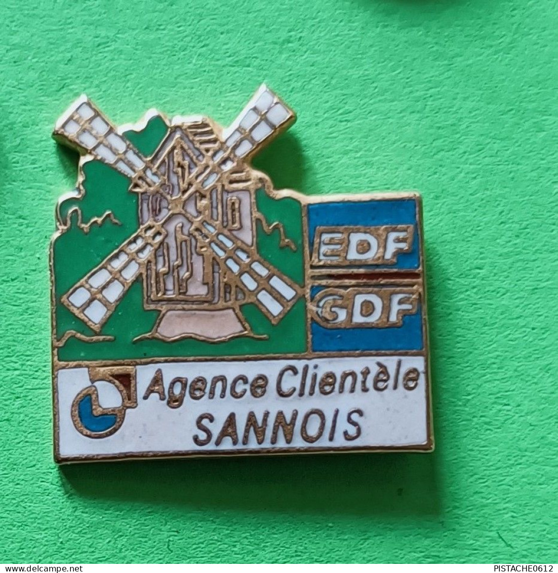 Pin's EDF-GDF Agence Clientéle Sannois Moulin - EDF GDF