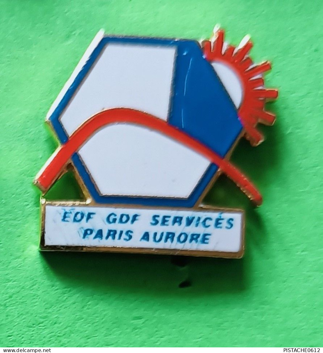 Pin's EDF-GDF Services Paris Aurore.(rayure Sur Le Bleu) - EDF GDF