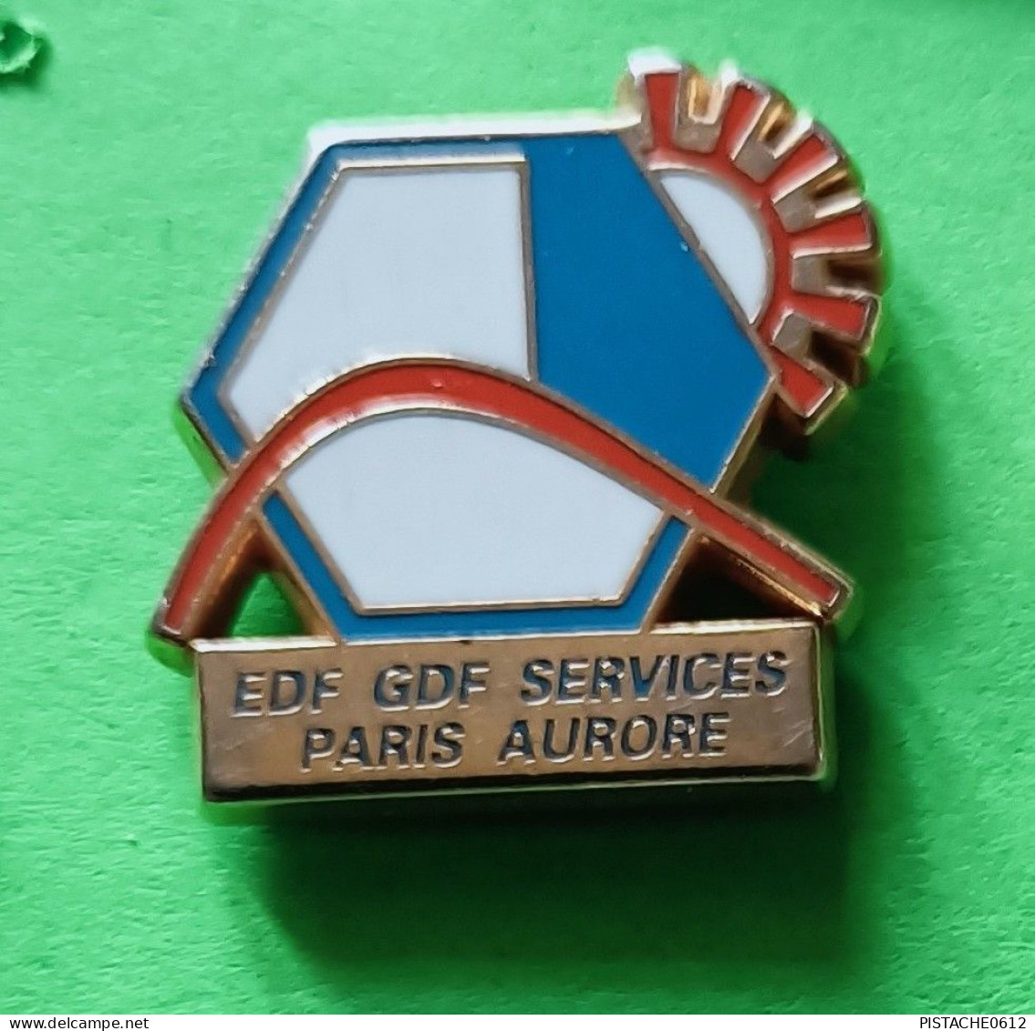 Pin's EDF-GDF Services Paris Aurore Signé Arcapea - EDF GDF