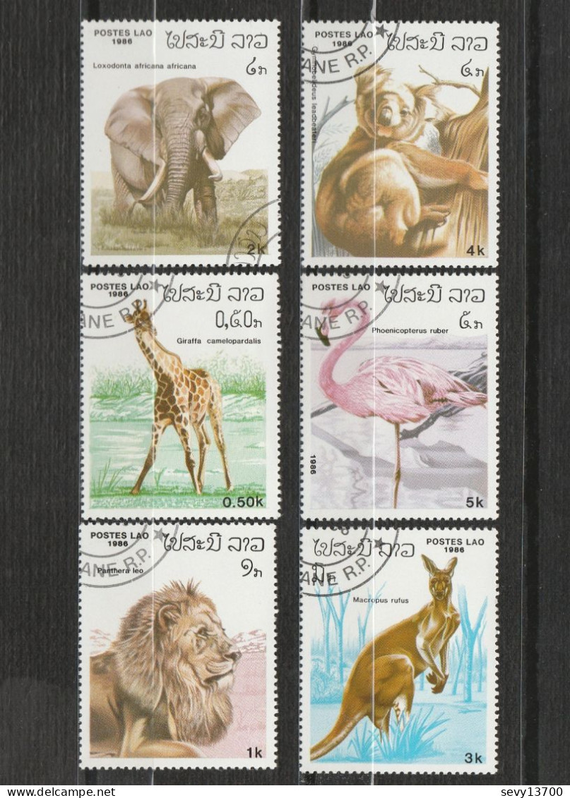 Laos Lot De 21 Timbres Les Animaux - éléphant, Lion, Kangourou, Flamand Rose, Koala, Girafe, Faisans, Serpents - Laos