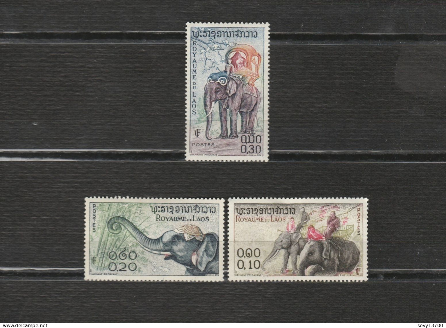 Laos Lot De 21 Timbres Les Animaux - éléphant, Lion, Kangourou, Flamand Rose, Koala, Girafe, Faisans, Serpents - Laos