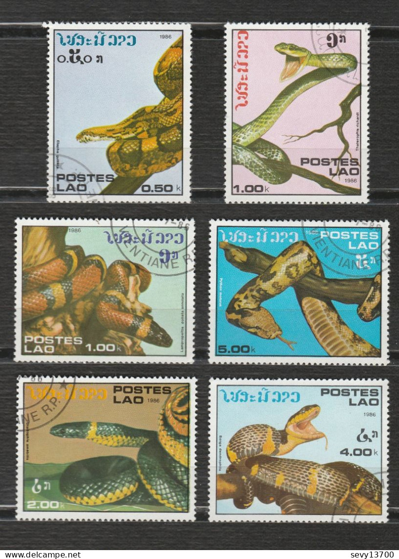 Laos Lot De 21 Timbres Les Animaux - éléphant, Lion, Kangourou, Flamand Rose, Koala, Girafe, Faisans, Serpents - Laos