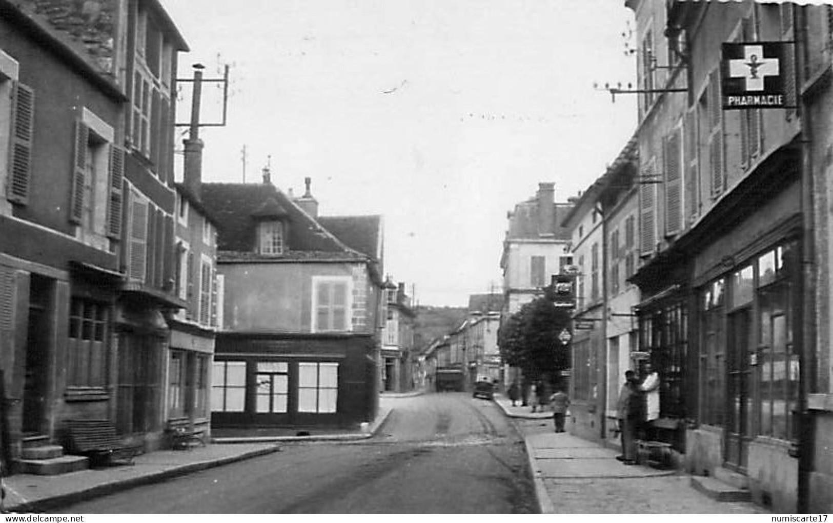 Cpsm ANCY LE FRANC 89 Grande Rue - Coiffeur, Pharmacie Boucherie En Face ( Aujourd'hui Optique, Cave à Vin, Boucherie ) - Ancy Le Franc