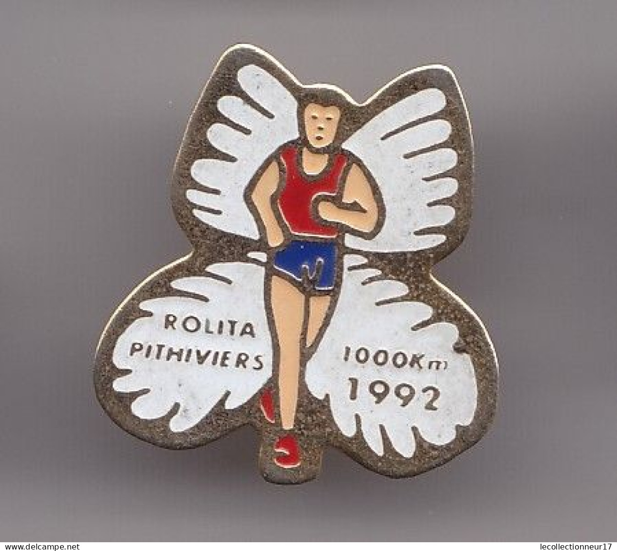 Pin's Rolita Pithiviers 1000 KM 1992  Dpt 45 Couse à Pied Papillon Réf 7345JL - Autres & Non Classés