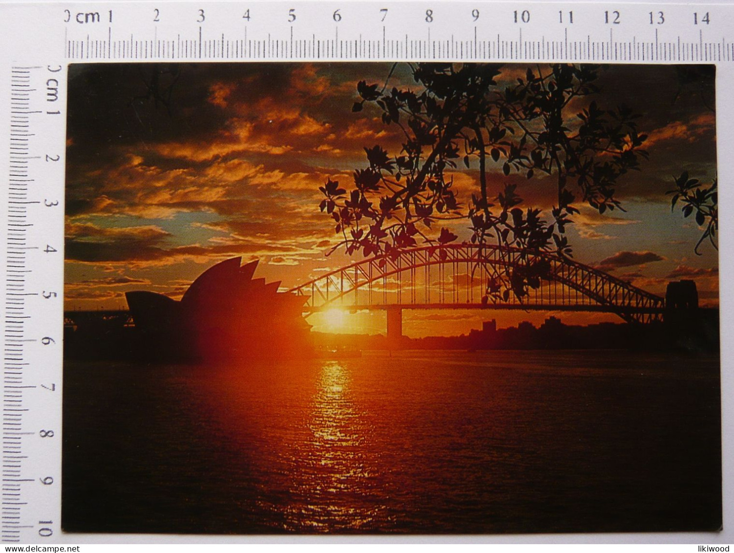 Sydney Opera House And Harbour Bridge, Silhouetted Against The Sunset - Sydney