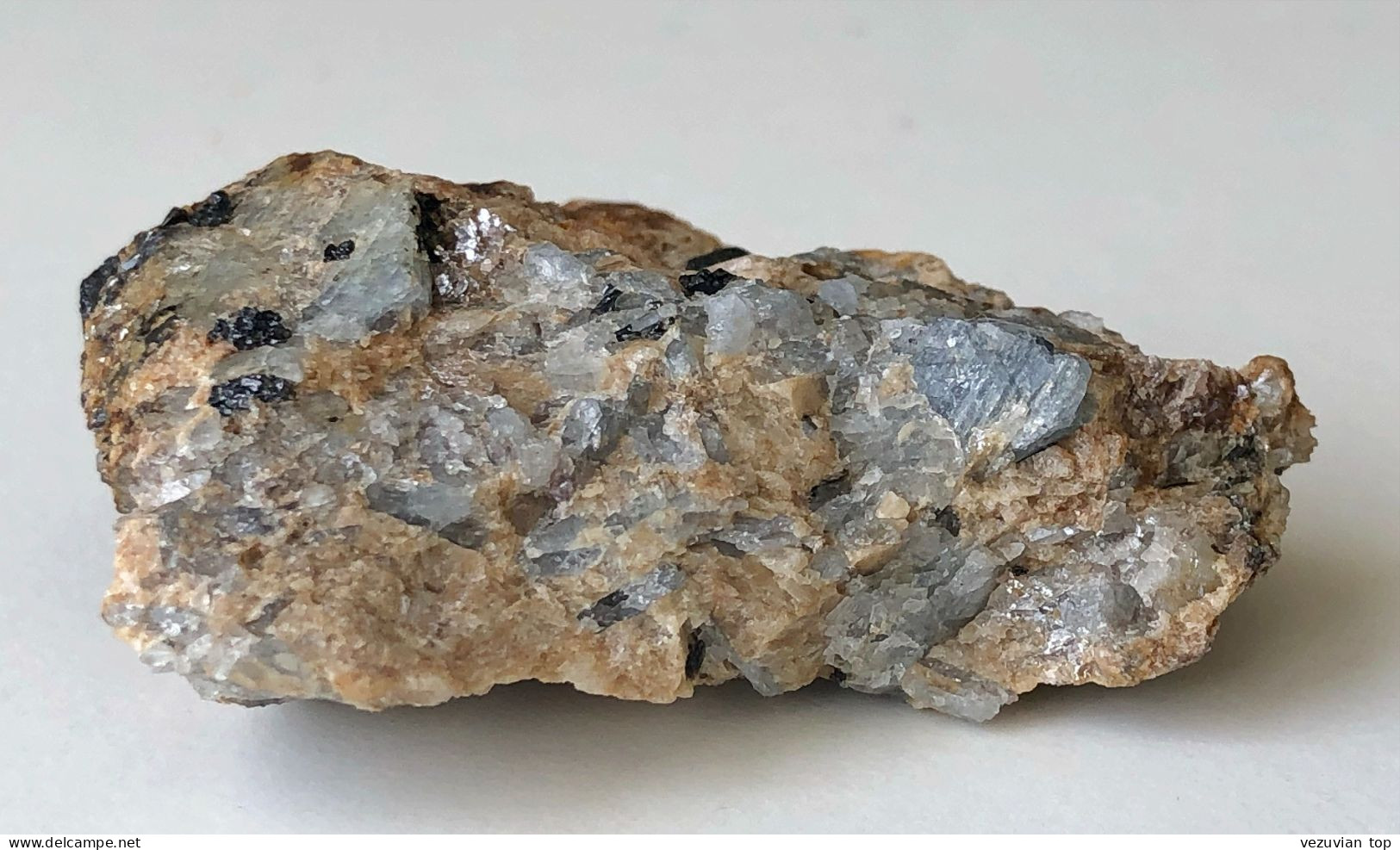 Columbite-(Fe), grey-blue Corundum in Feldspar matrix