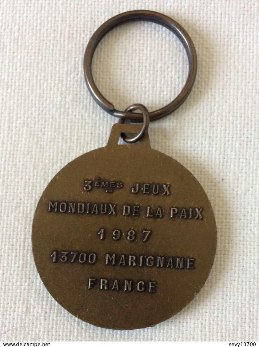 Porte Clef 3ème Jeux Mondiaux De La Paix 1987 - 13700 Marignane - Athlétisme