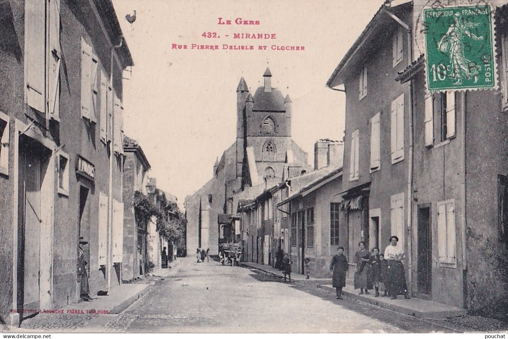 A7-32) MIRANDE - GERS - RUE PIERRE DELISLE ET LE CLOCHER - ANIMEE - HABITANTS   - EN 1913 - Mirande