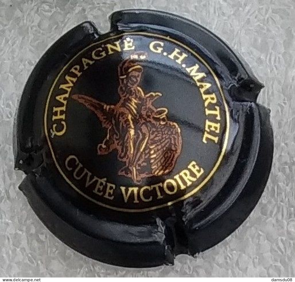 1 Capsule Champagne Martel G. H.	Cuvée Victoire - Martel GH