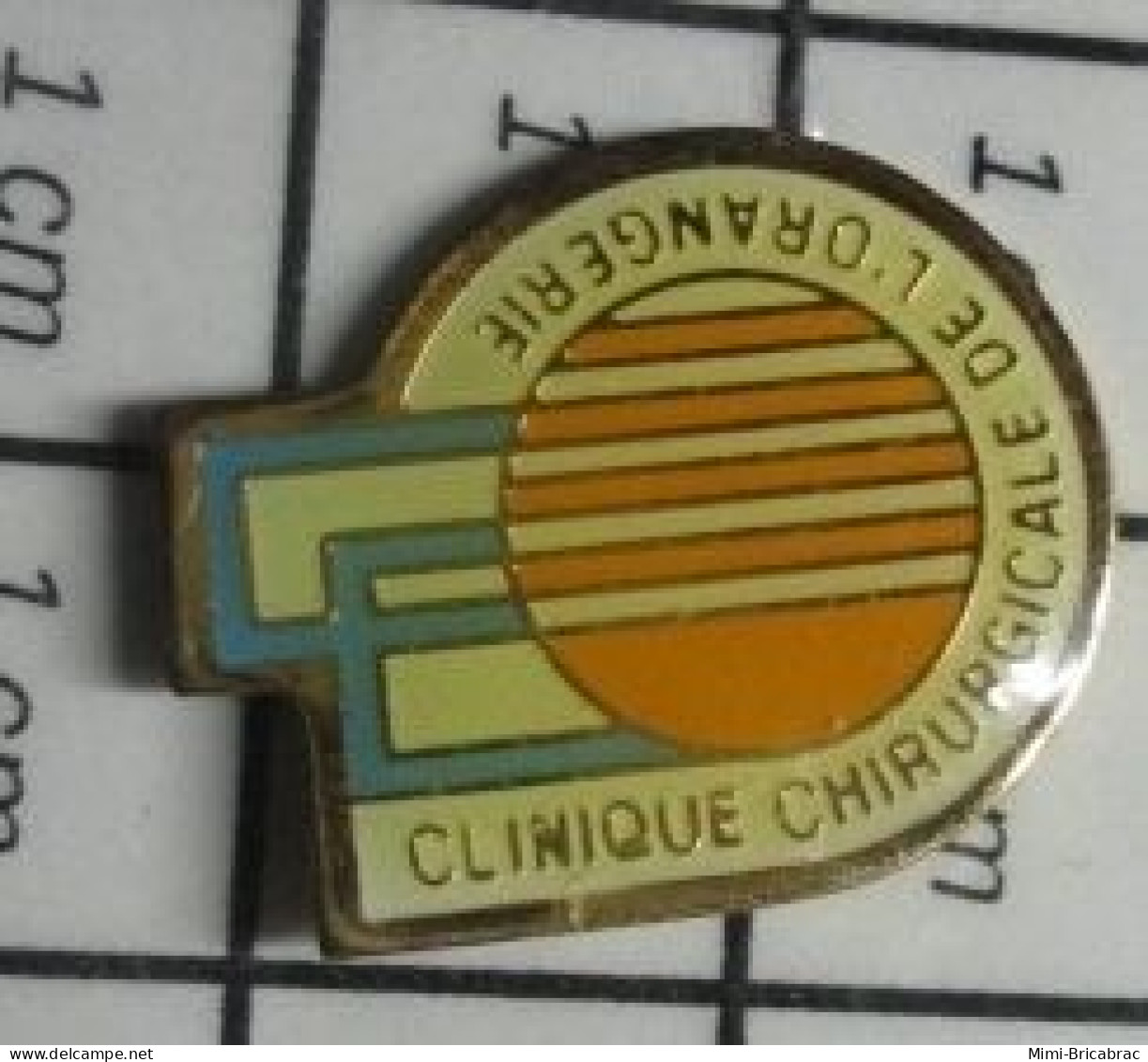 1719 Pin's Pins / Beau Et Rare : MEDICAL / CLINIQUE CHIRURGICALE DE L'ORANGERIE - Trademarks