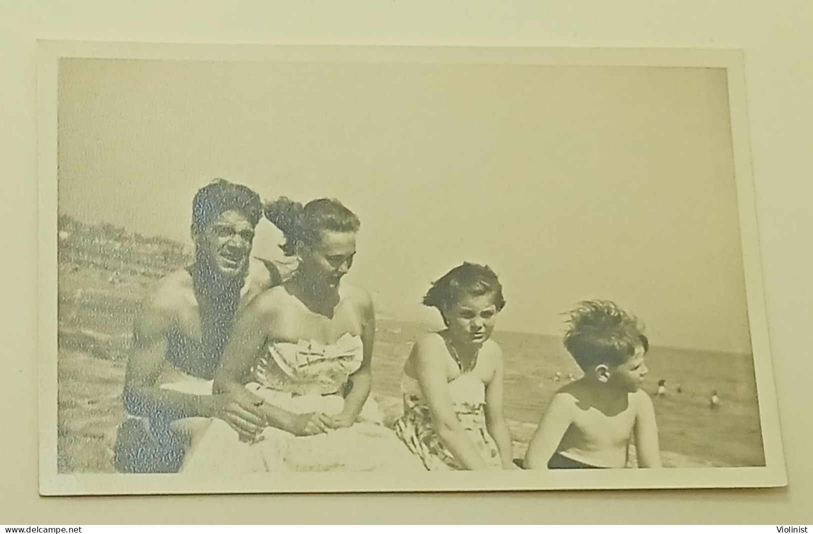 Boy, Young Girl, Woman And Man On The Beach In Windy Weather - Personnes Anonymes