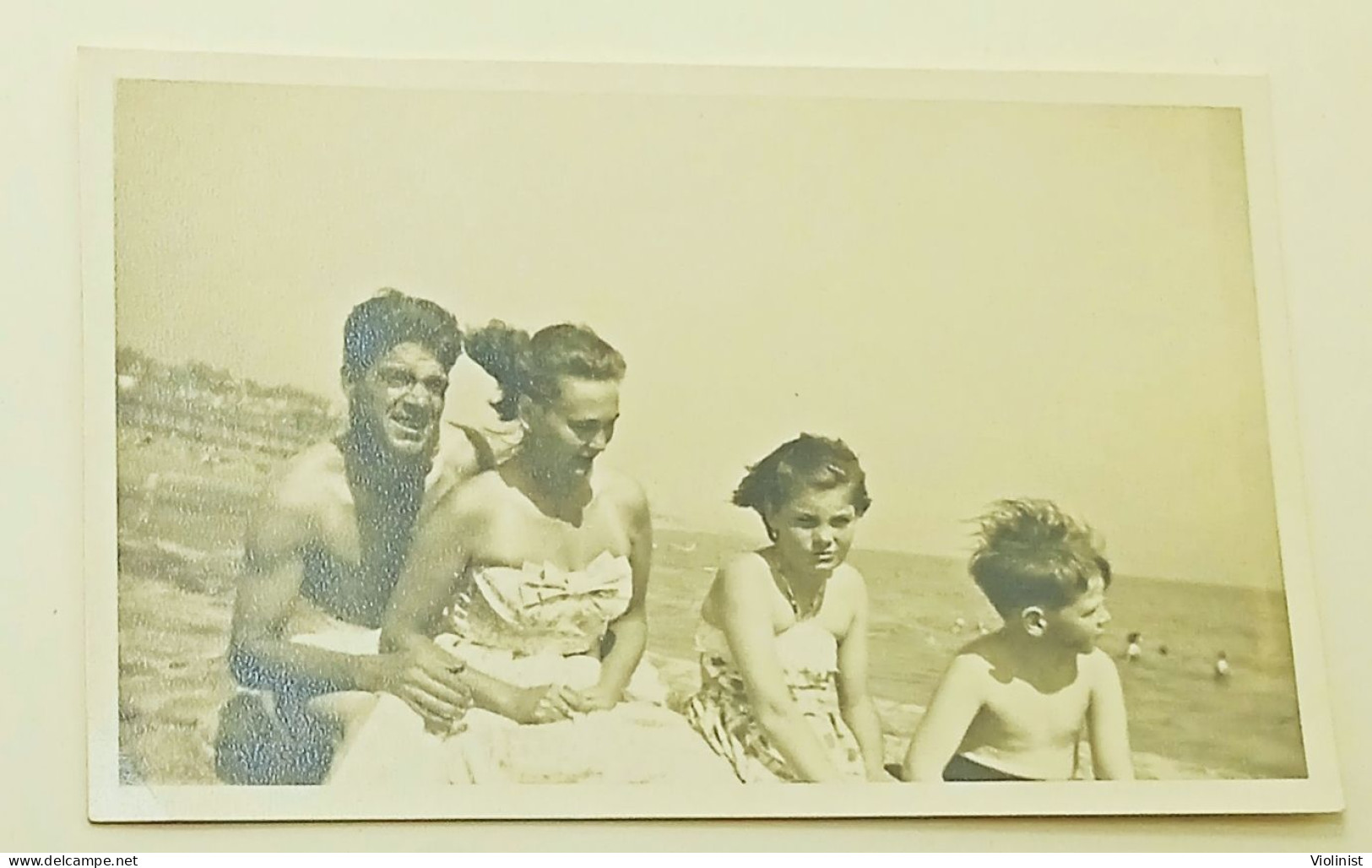 Boy, Young Girl, Woman And Man On The Beach In Windy Weather - Personnes Anonymes