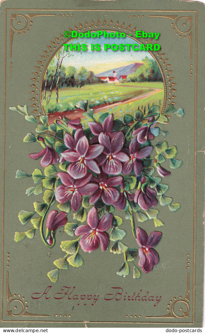 R424232 A Happy Birthday. Purple Flowers. Postcard. 1911 - Welt