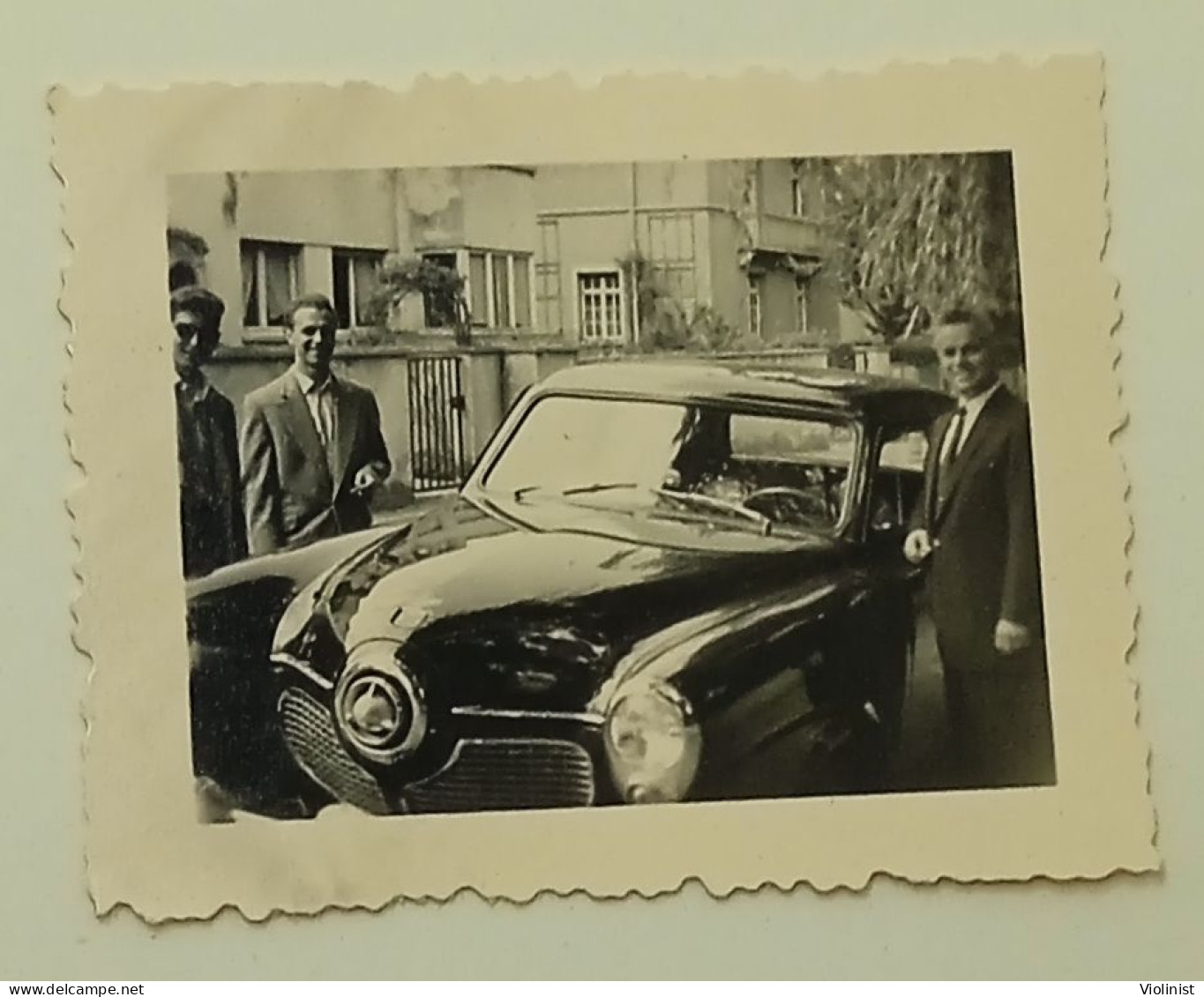 People On The Street By The Car Studebaker Commander - Cars