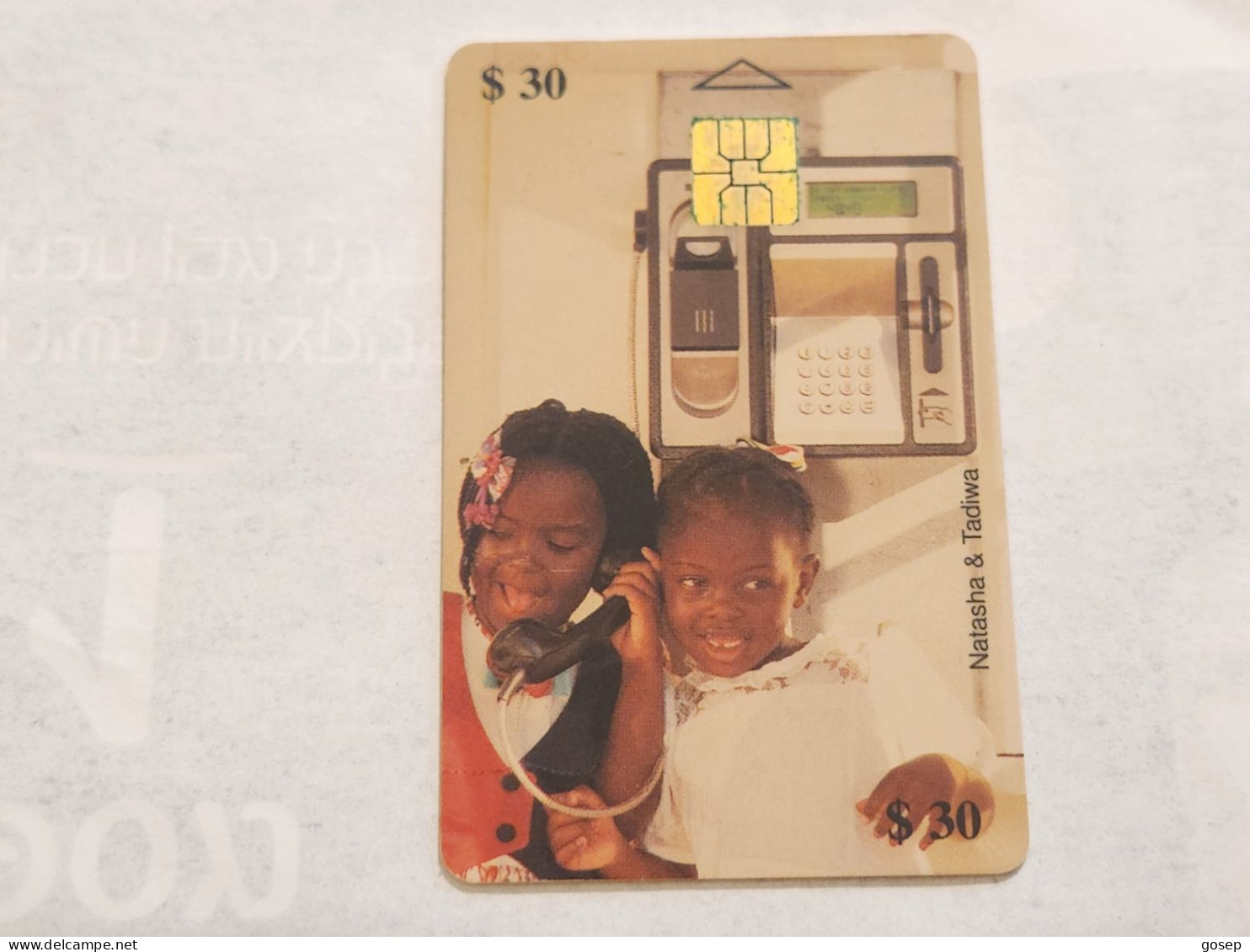 Zimbabwe-(ZIM-14)-Natasha & Tadiva 1-(76)-($30)-(0018-016639)-(1/05/2000)-(tirage-20.000)-used Card - Simbabwe