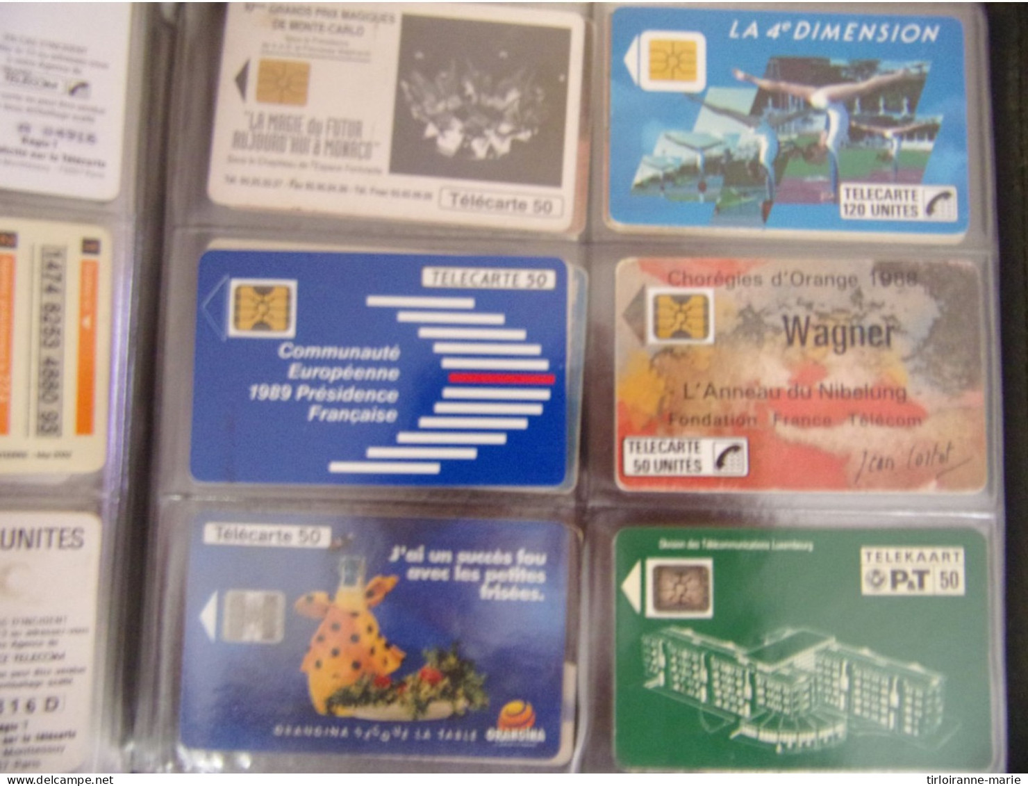 lot de + de 2000 telecartes usagees toutes epoques depuis le debut + albums remplis aussi ...