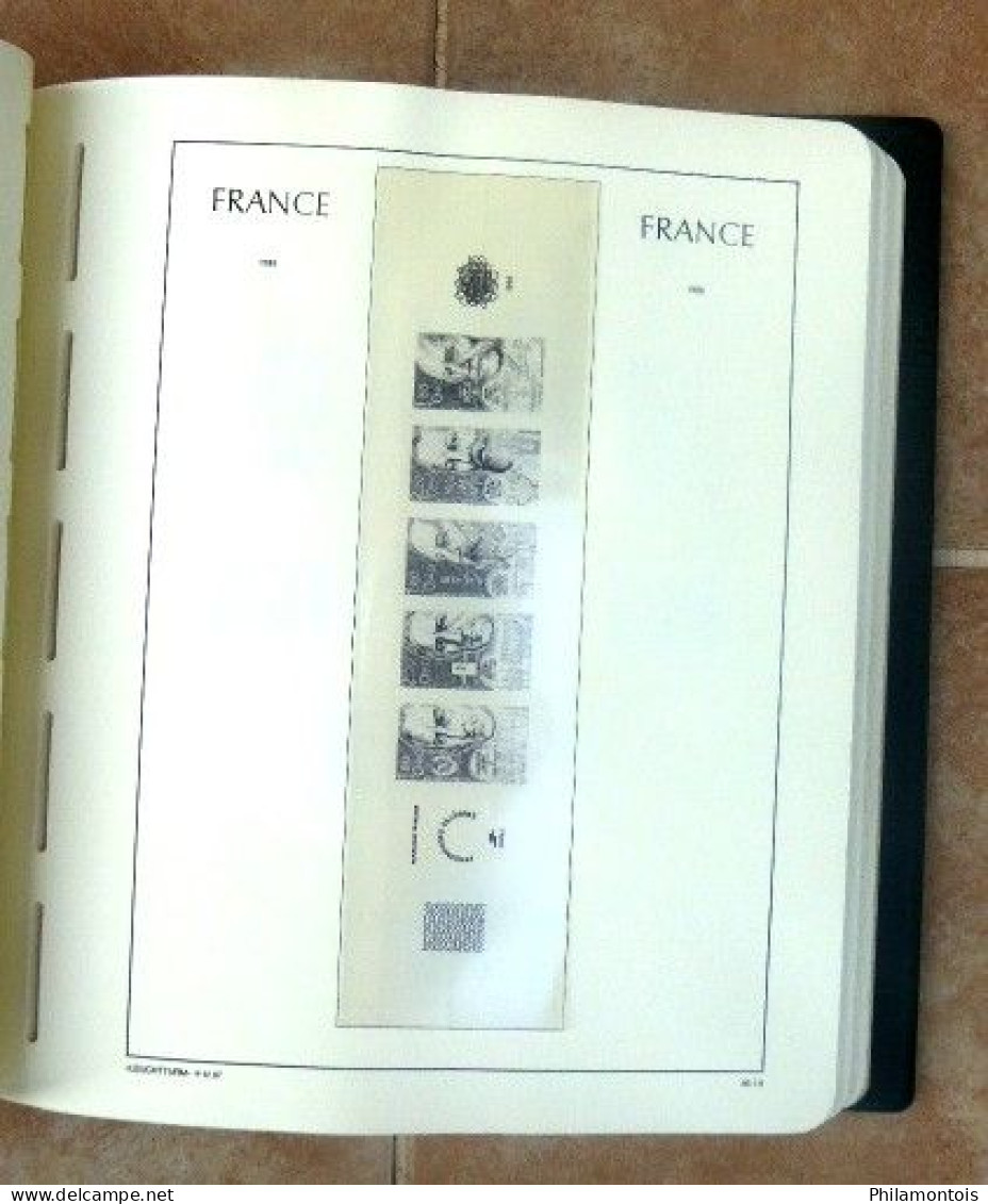 Album LEUCHTTURM + intérieur FRANCE 1980/1994 sans charnière - 110 pages environ - Bon état.