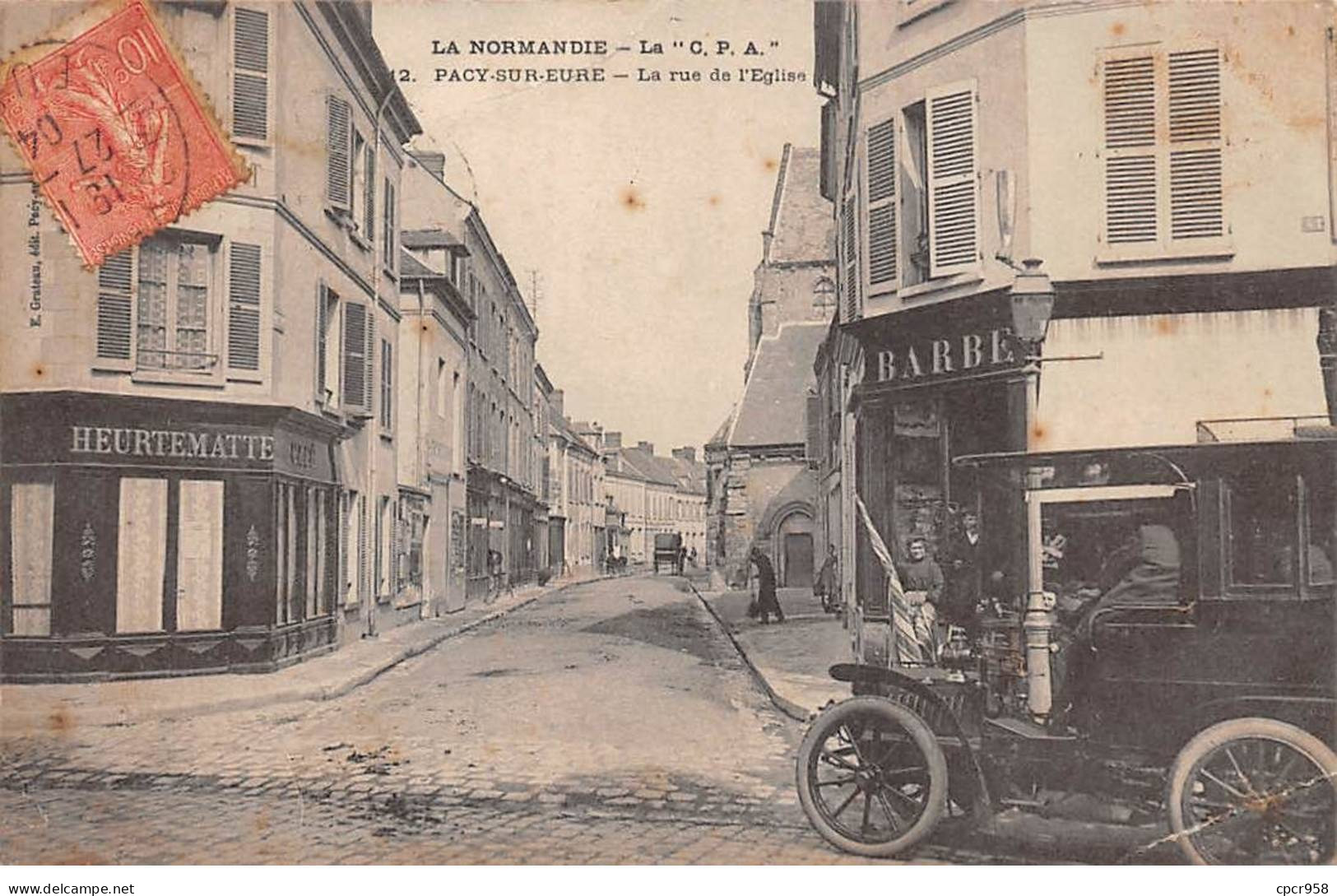 27 - PACY SUR EURE - SAN43319 - La Rue De L'Eglise - Voiture - Pacy-sur-Eure