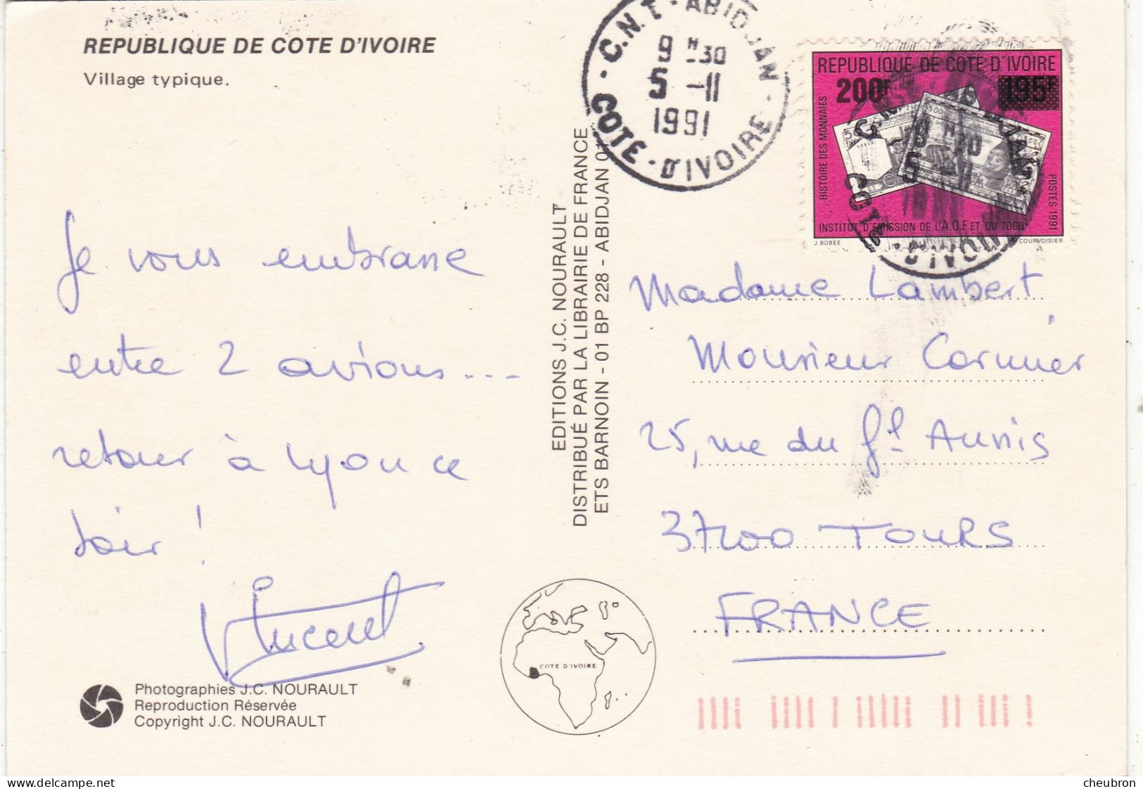 COTE D'IVOIRE. CPSM. .VILLAGE TYPIQUE. ANNEE 1991 + TEXTE + TIMBRE - Côte-d'Ivoire