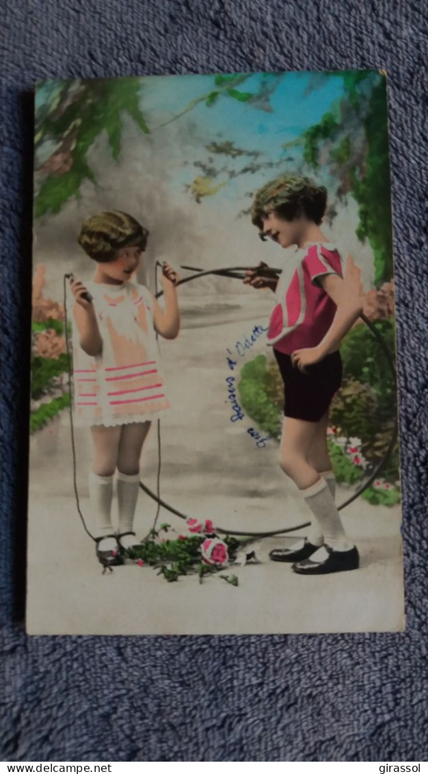 CPA JEUX D ENFANTS FILLE FILLETTE SAUT A LA CORDE CERCEAU 1931 ROSES - Szenen & Landschaften