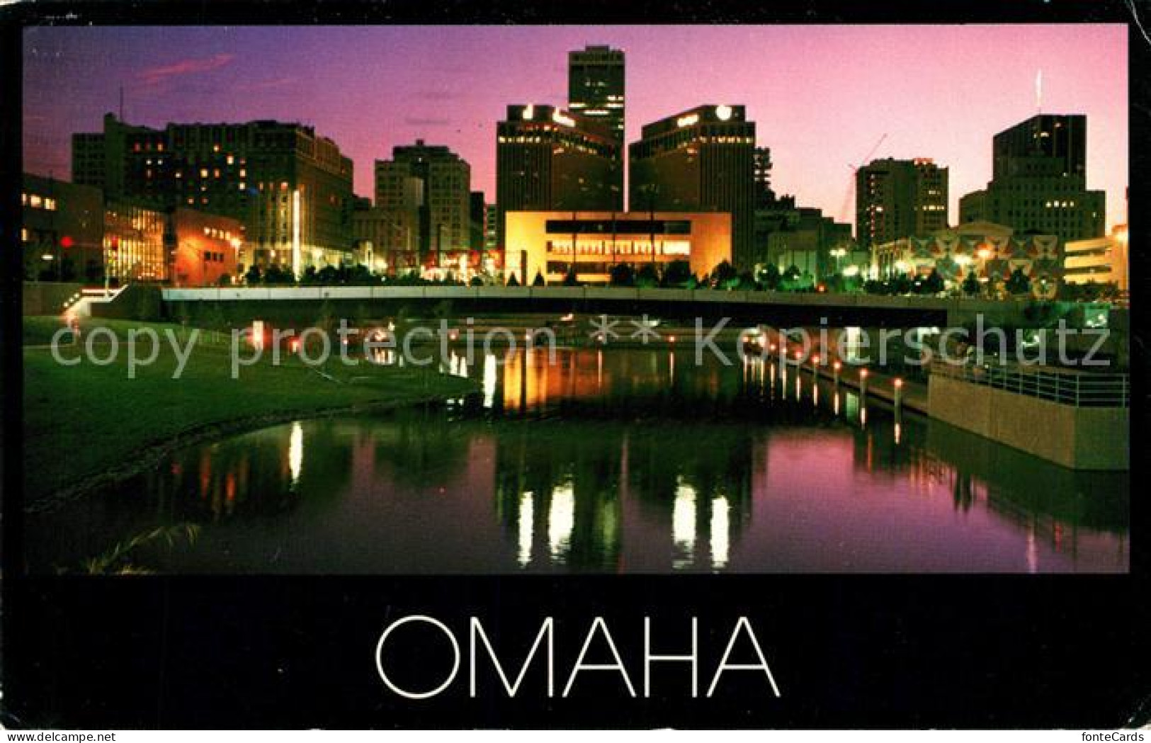 73130134 Omaha_Nebraska Central Park Mall Skyline At Night - Andere & Zonder Classificatie
