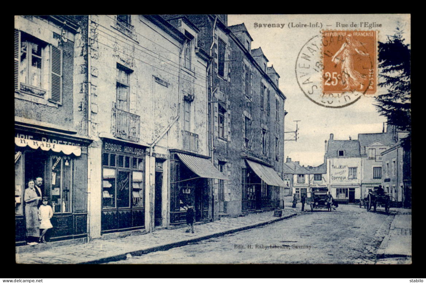 44 - SAVENAY - RUE DE L'EGLISE - LIBRAIRIE H. RABY - TAILLEUR BENOISTEN - HORLOGERIE BOSQUE - GARAGE GUZON - Savenay