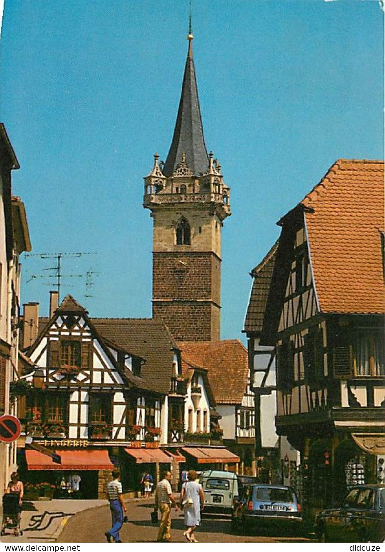 Automobiles - Obernai - La Rue SaInte-OdIle Et Le Kapellturm - CPM - Voir Scans Recto-Verso - Passenger Cars