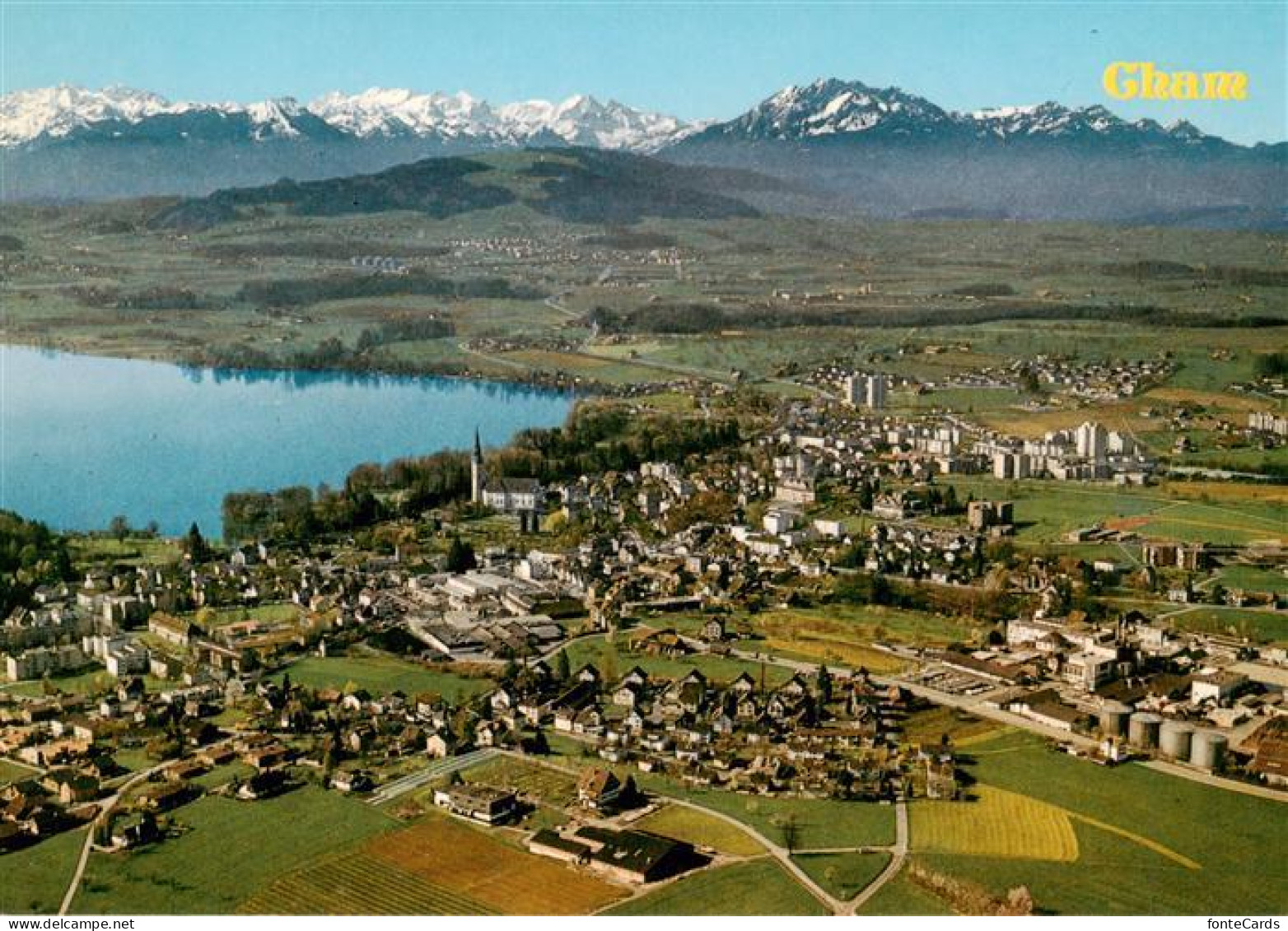 13920976 Cham__ZG Fliegeraufnahme Mit Zugersee Und Alpen - Autres & Non Classés