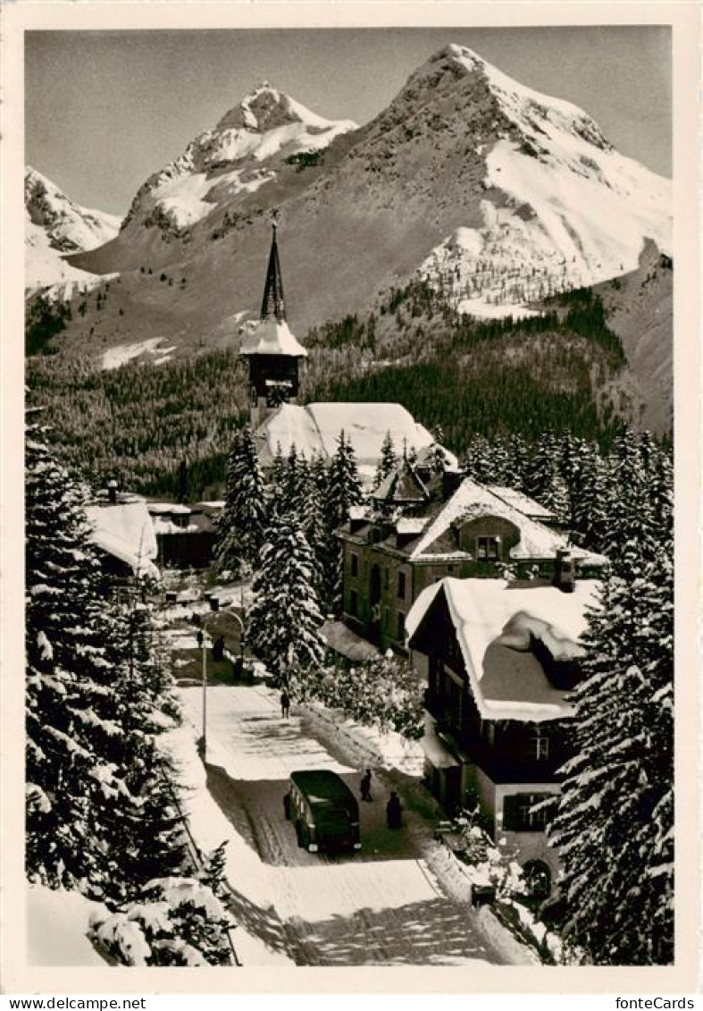 13870698 Arosa GR Dorfkirche Blick Auf Furkahoerner Winter In Den Alpen Arosa GR - Otros & Sin Clasificación