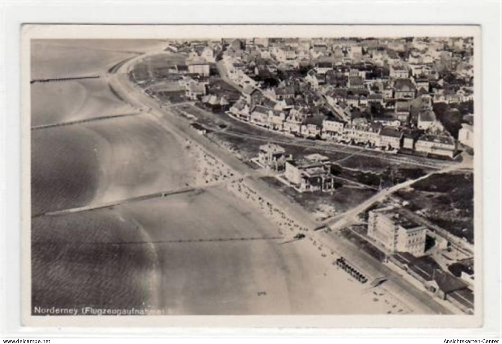 39074905 - Norderney Mit  Flugzeugaufnahme Gelaufen, 1936. Leichter Schrift- Und Stempeldurchdruck, Sonst Gut Erhalten - Norderney