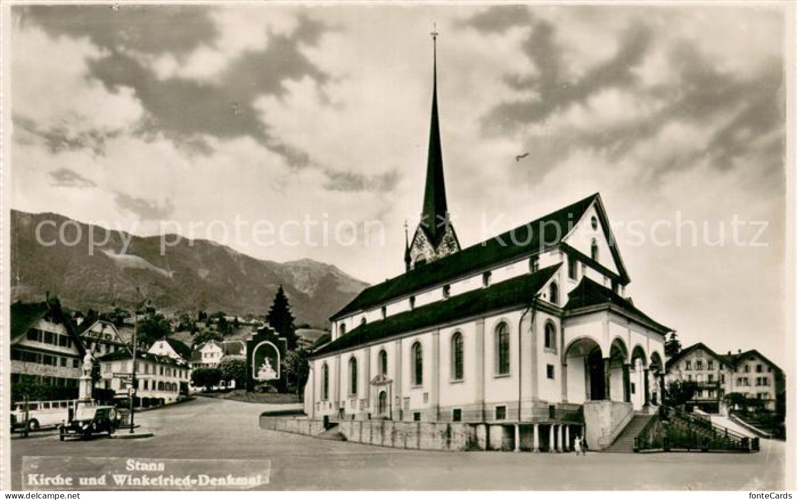 13735572 Stans NW Kirche Und Winkelried Denkmal Stans NW - Autres & Non Classés