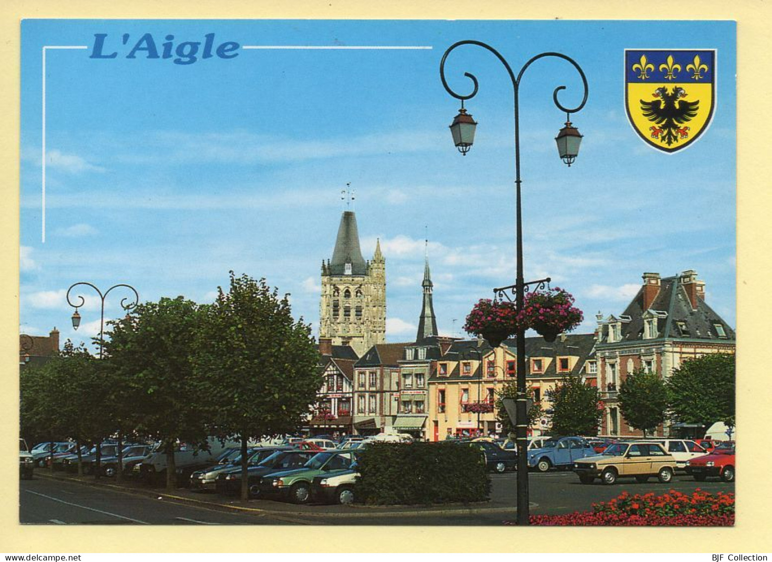 61. L'AIGLE – L'Eglise Saint-Martin Et La Place Bois Landry / Blason (voir Scan Recto/verso) - L'Aigle