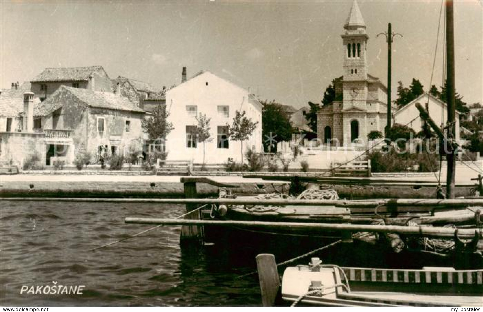 73851459 Pakostane Croatia Im Hafen Blick Zur Kirche  - Croatie