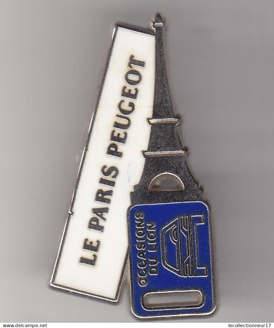 Pin's En Forme De Clef Le Paris  Peugeot Occasion Du  Lion Réf 5733JL - Peugeot