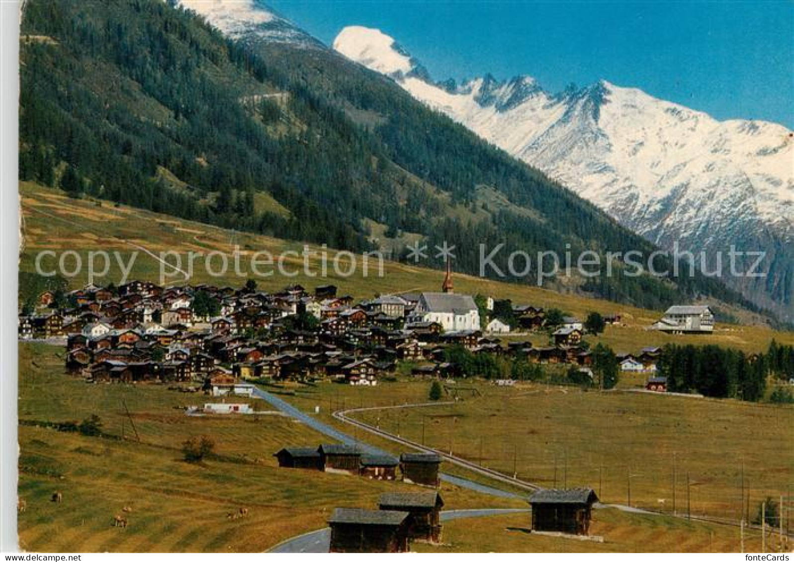 13558201 Muenster Goms Gesamtansicht Mit Blick Zum Galenstock Walliser Alpen Mue - Sonstige & Ohne Zuordnung