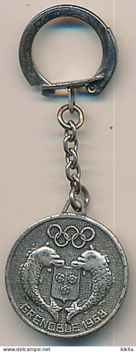 Porte Clefs Métallique Des X° Jeux Olympiques D'Hiver De Grenoble 1968  Olympic Games 68 Dauphins Trois Roses - Key-rings