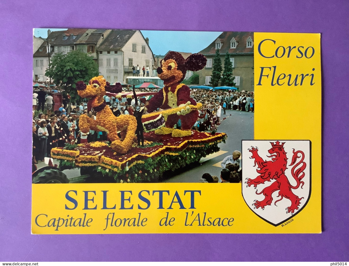 67     CPSM  SELESTAT     Capitale Florale De L’Alsace   Corso Fleuri Mickey….   Très Bon état - Selestat