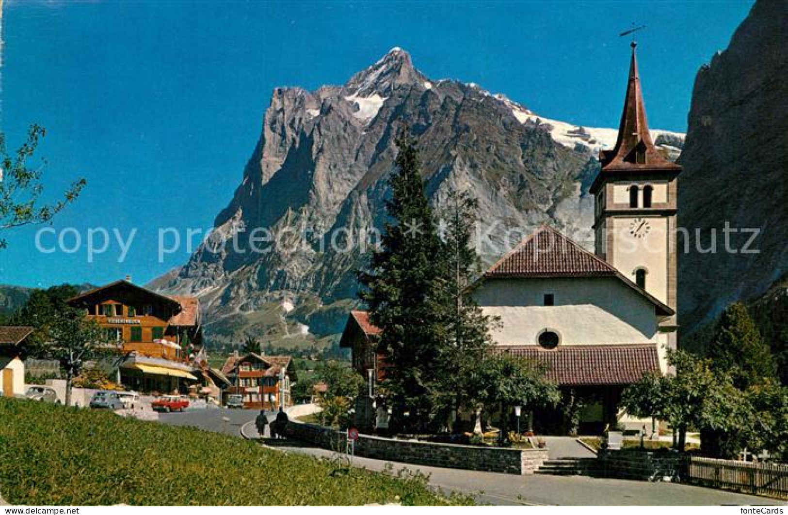 12944278 Grindelwald Mit Kirche Und Wetterhorn Grindelwald - Autres & Non Classés