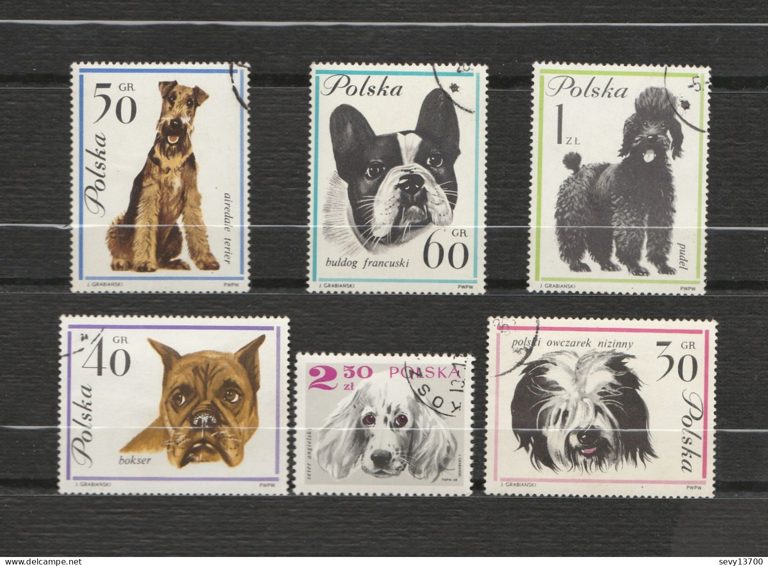 Pologne - 58 timbres animaux - poissons insectes chevaux oiseaux chiens chats oiseaux serpents grenouilles tortue singe