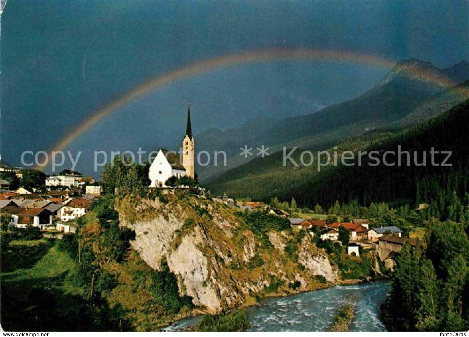 12840560 Bad Scuol Blick Ueber Den Fluss Zur Kirche Regenbogen Alpen Scuol - Autres & Non Classés