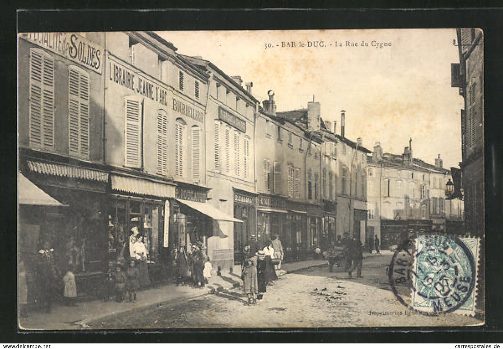 CPA Bar-le-Duc, La Rue Du Cygne, Boutiques Et Libairie Jeanne D`Arc  - Bar Le Duc