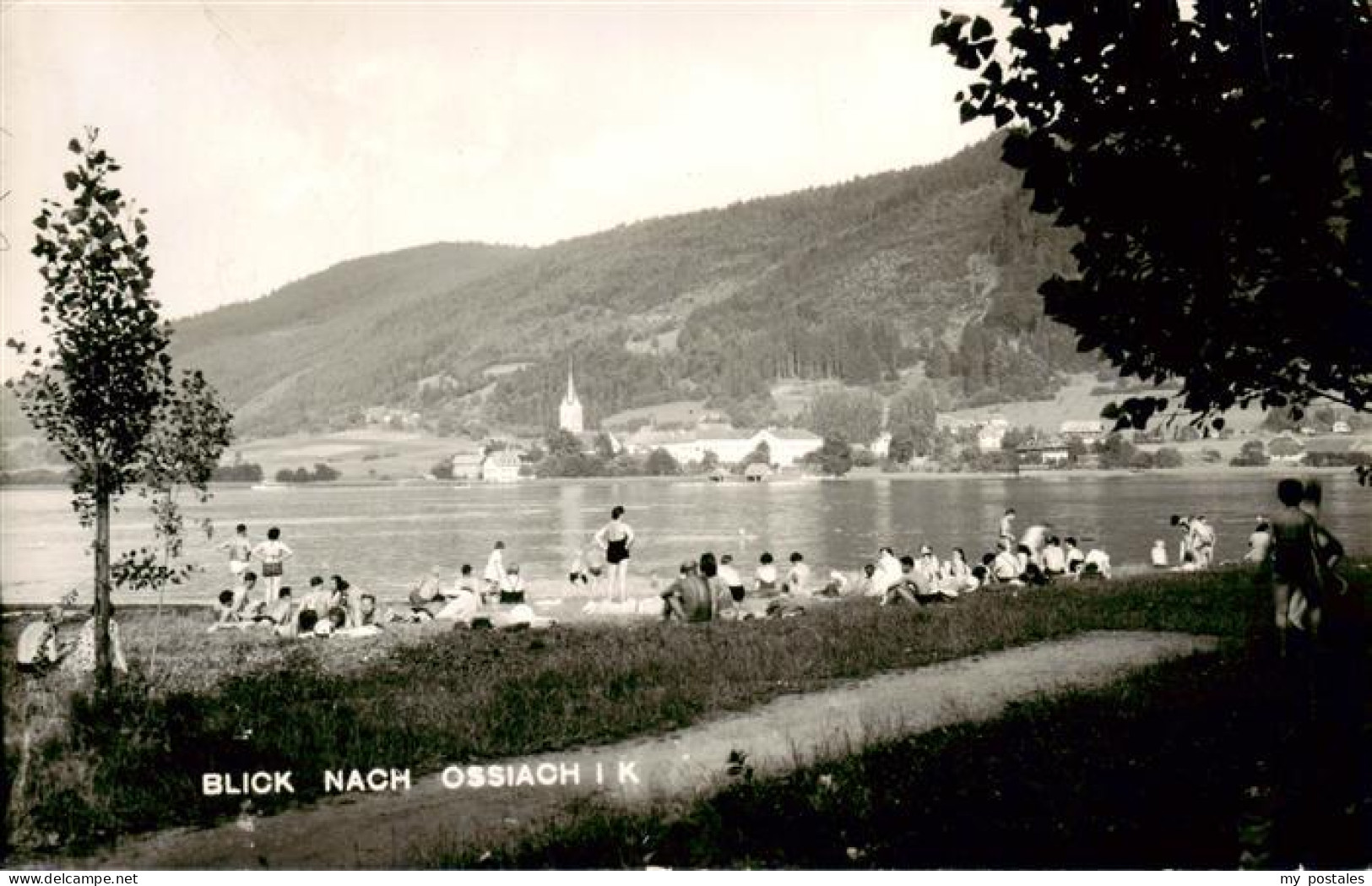 73900118 Ossiach Ossiachersee Kaernten AT Uferpartie Am See Mit Blick Auf Den Or - Andere & Zonder Classificatie