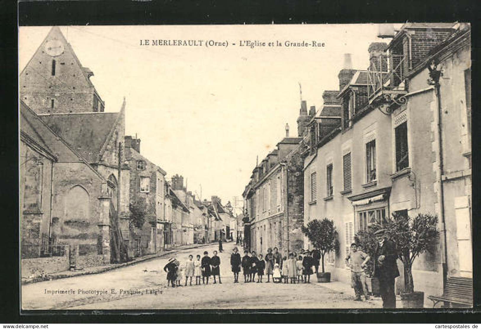 CPA Le Merlerault, L`Eglise Et La Grande-Rue  - Le Merlerault