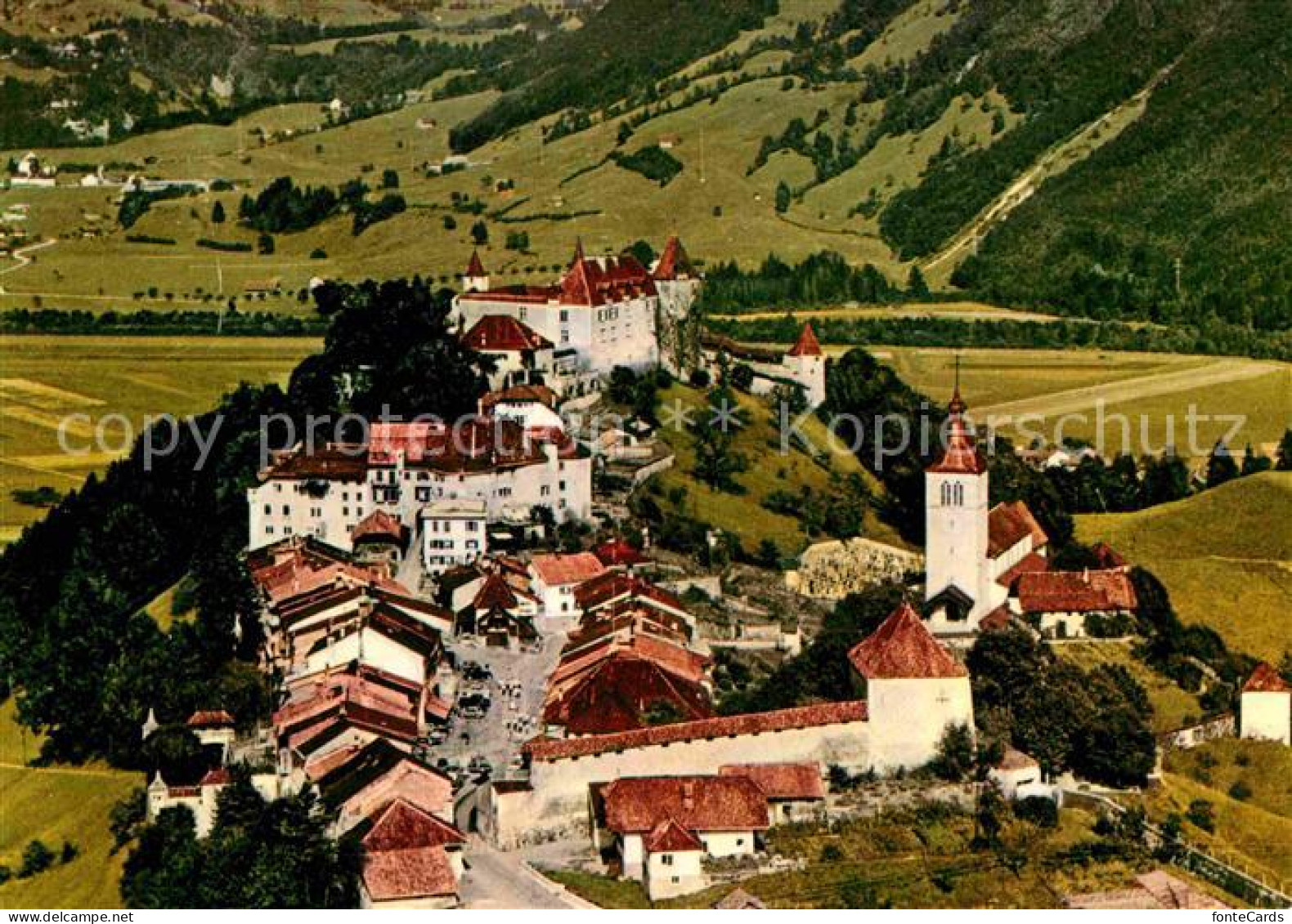 12682152 Gruyeres FR Fliegeraufnahme Burg Kirche  Gruyeres - Altri & Non Classificati