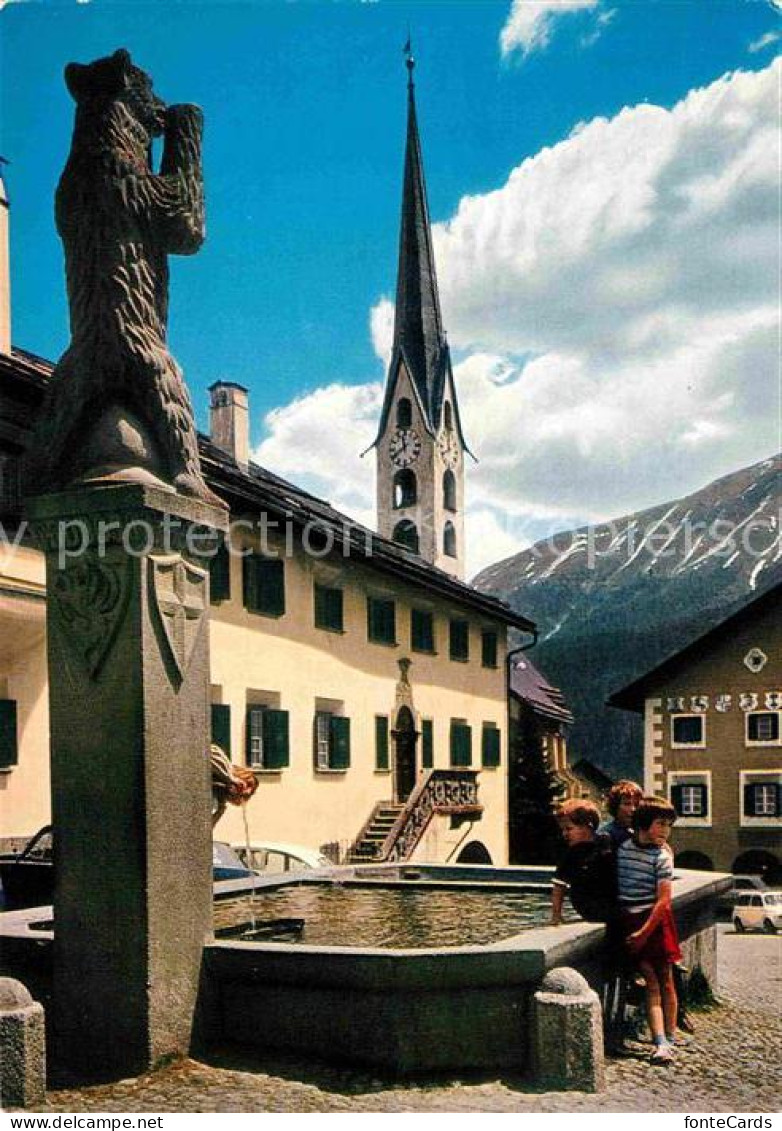 12663714 Zuoz GR Dorfbrunnen Skulptur Kirche Zuoz - Altri & Non Classificati