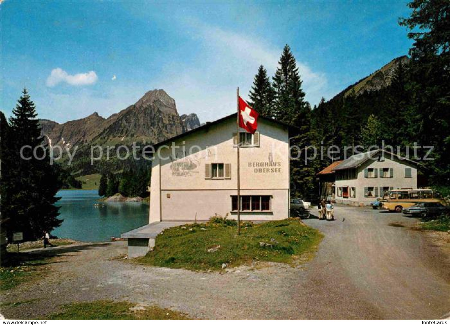 12649192 Naefels Berghaus Obersee Mit Bruennelistock Schweizer Flagge Naefels - Other & Unclassified